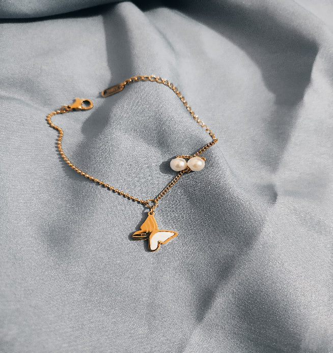 Elegant Butterfly & Pearl Charm Bracelet