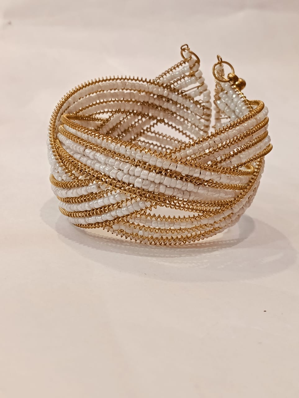 Elegant White Beaded Bangle with Gold Wire Detailing